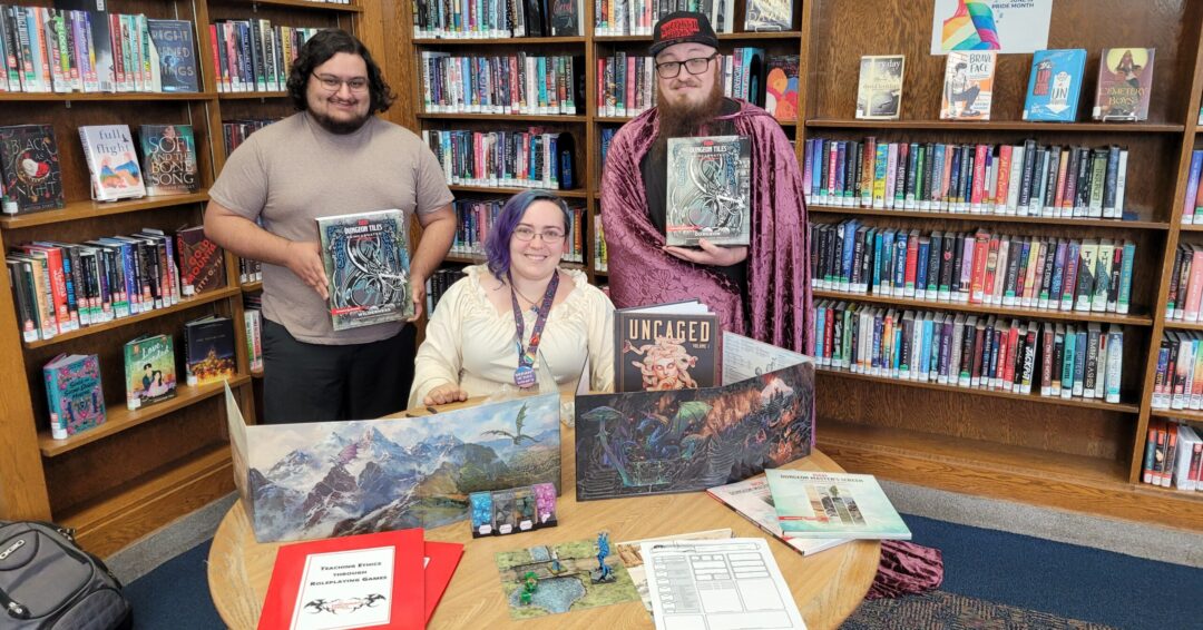 Picture of UC Philosophy grad students and UC staff at Westwood Public Library for teaching ethics through roleplaying games. g