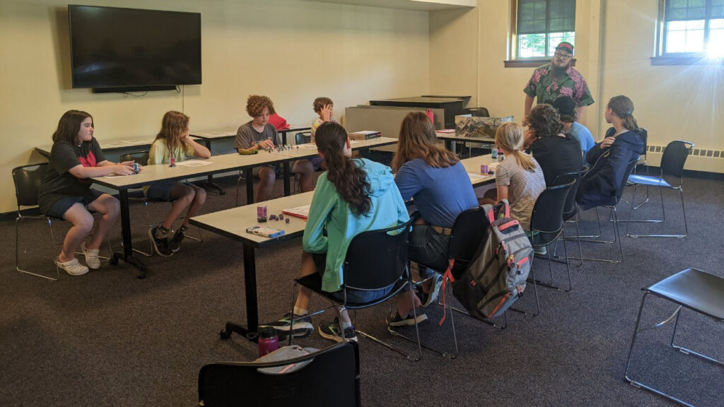 Philosophy Graduate Student, Jonathan McKinney, teaches philosophy in his role as Game Master playing Dungeons and Dragons (D&D) at Westwood Public Library